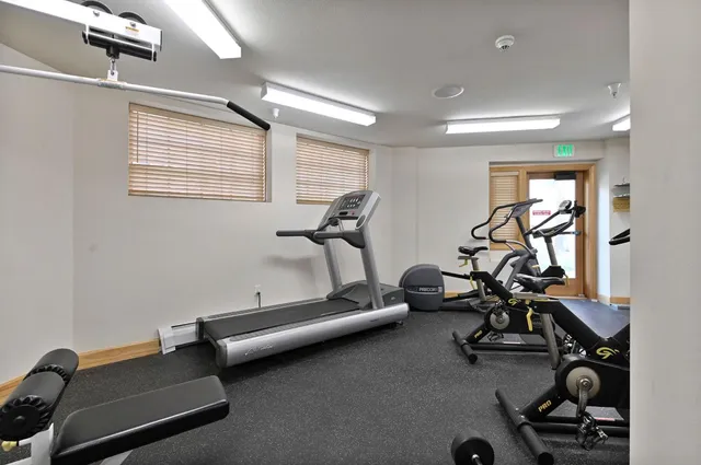 a view of a room with gym equipment