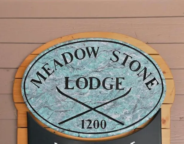 a view of a livingroom with wooden floor