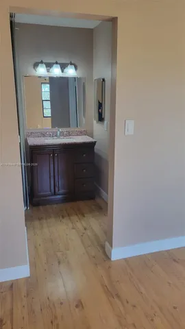 a bathroom with a toilet and a bathtub