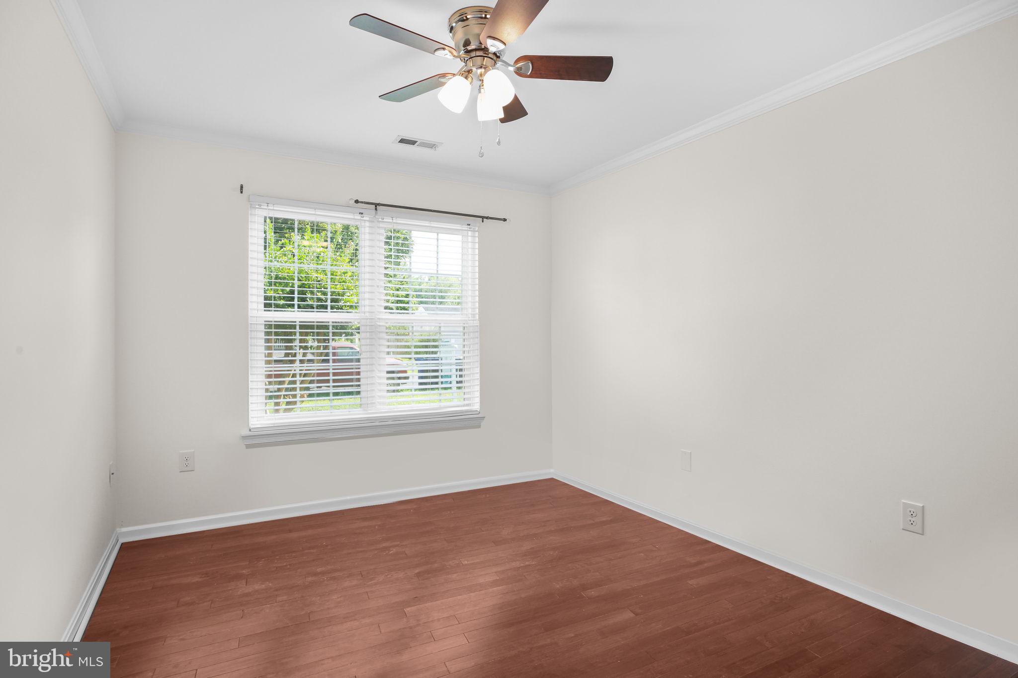 5705 Cascade Drive Fredericksburg, VA 22407 - Photo 23 of 32 an empty room with windows and fan