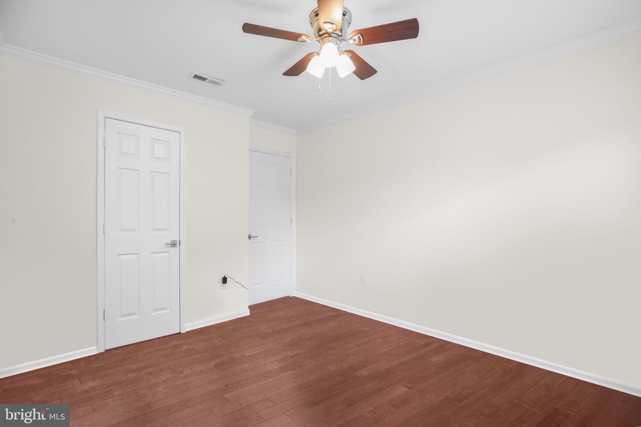 5705 Cascade Drive Fredericksburg, VA 22407 - Photo 24 of 32 an empty room with closet and fan