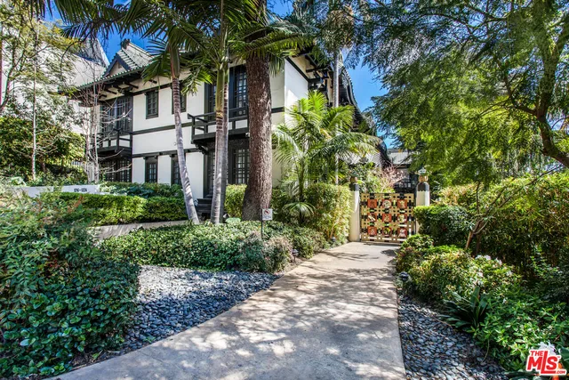 a view of a door and garden