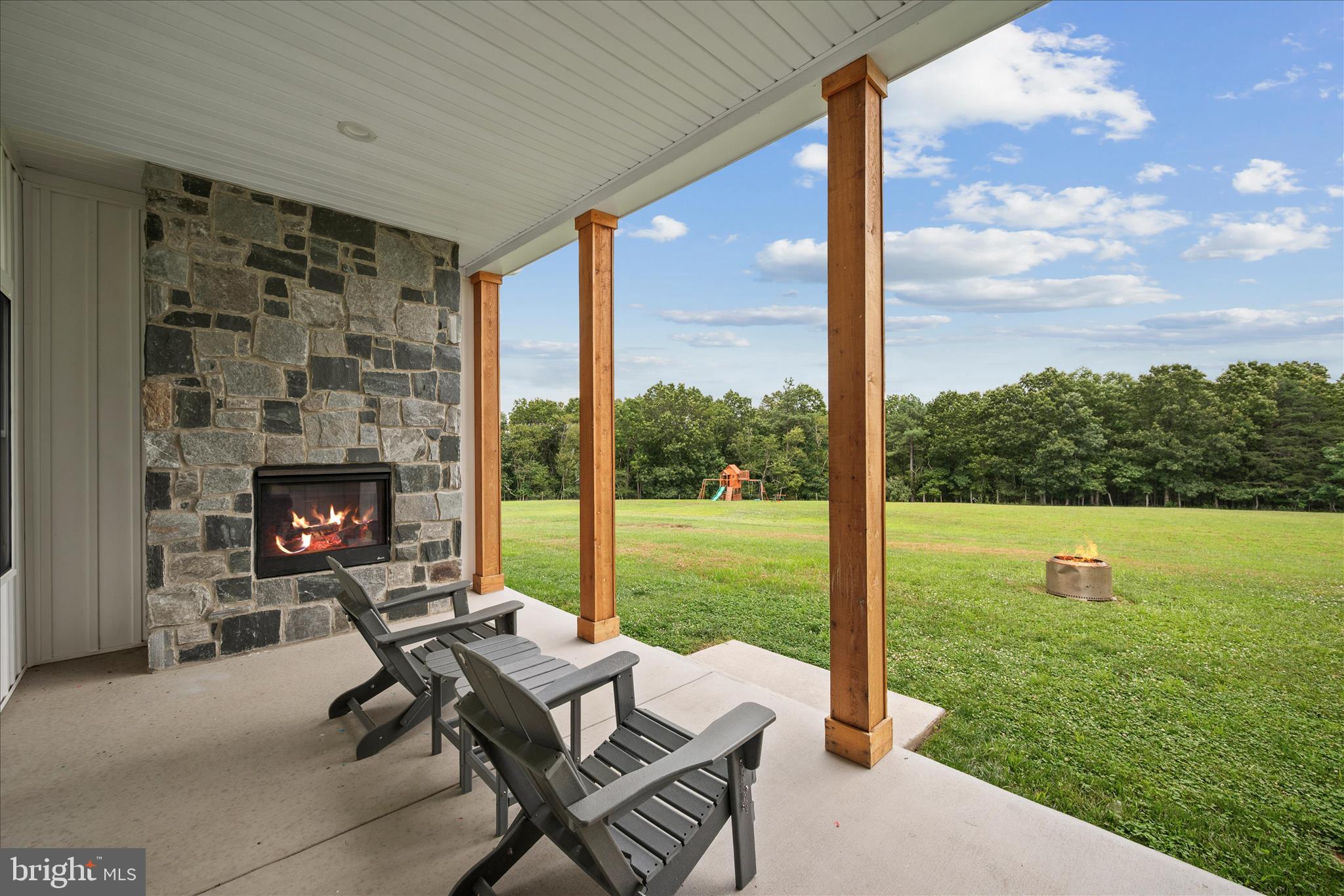886 Middle Fork Road Cross Junction, VA 22625 - Photo 3 of 80 Rear covered patio with outdoor gas fireplace