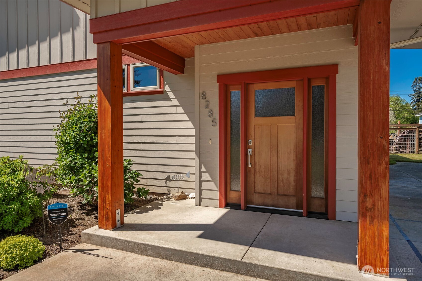8285 Sunset Street Blaine, WA 98230 - Photo 12 of 38 a view of a house with a door and a window