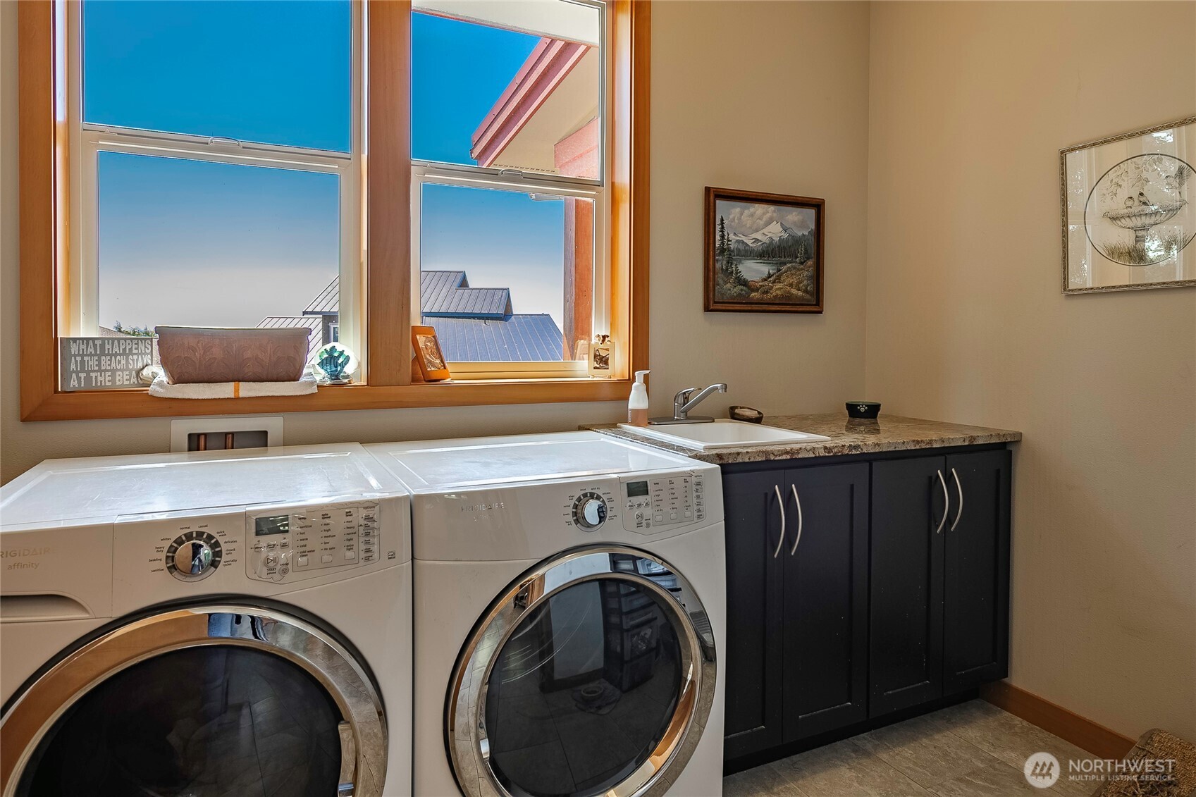 8285 Sunset Street Blaine, WA 98230 - Photo 30 of 38 a utility room with dryer and washer