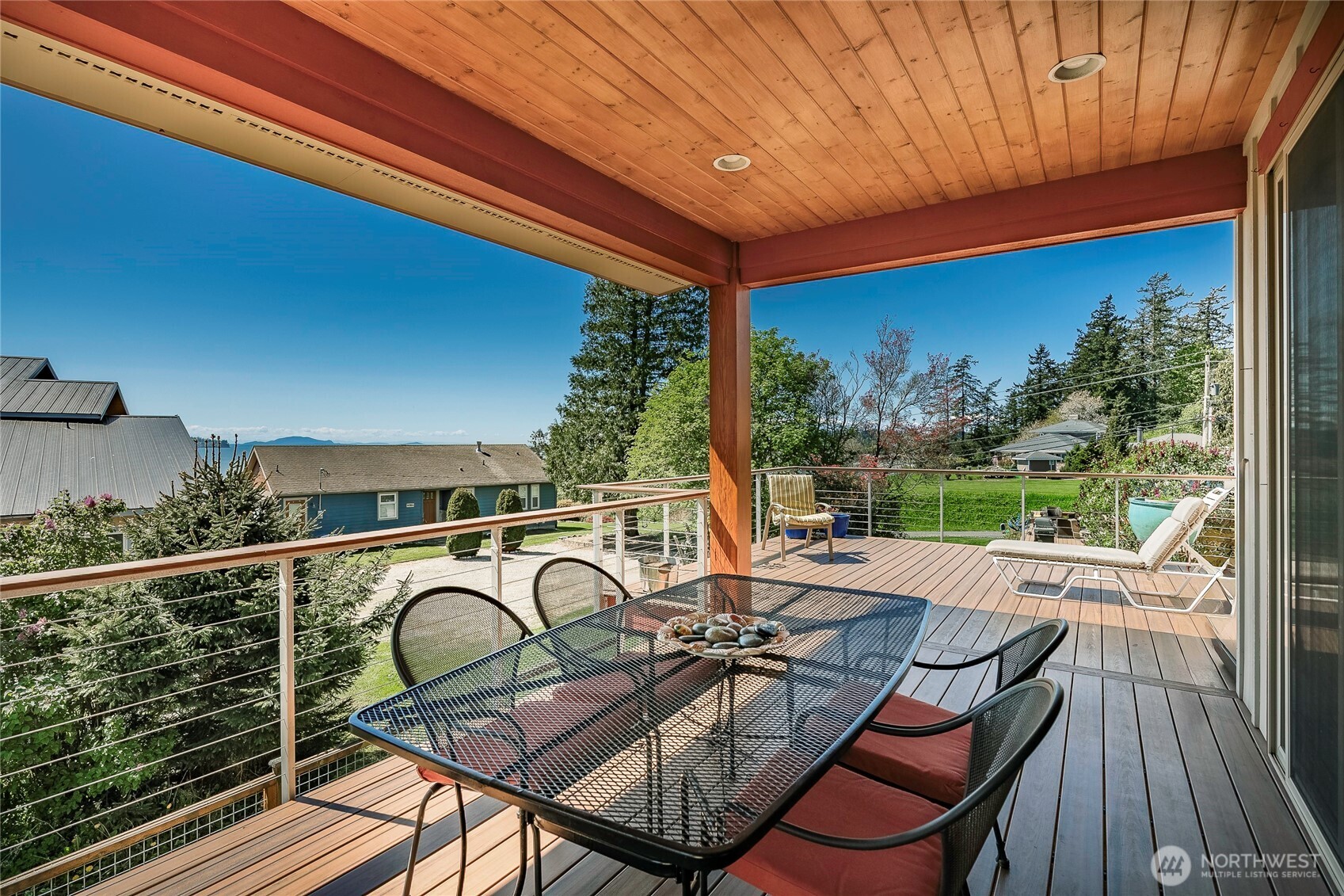 8285 Sunset Street Blaine, WA 98230 - Photo 31 of 38 a view of a chairs and table in patio