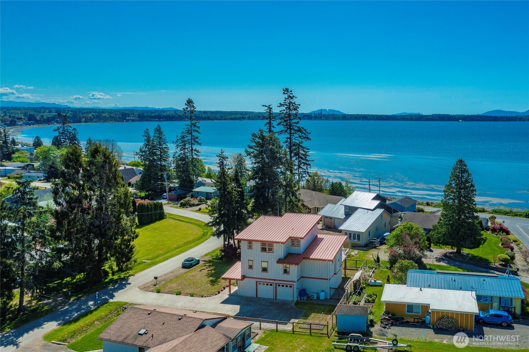8285 Sunset Street Blaine, WA 98230 - Photo 5 of 38 a view of a lake with sitting space