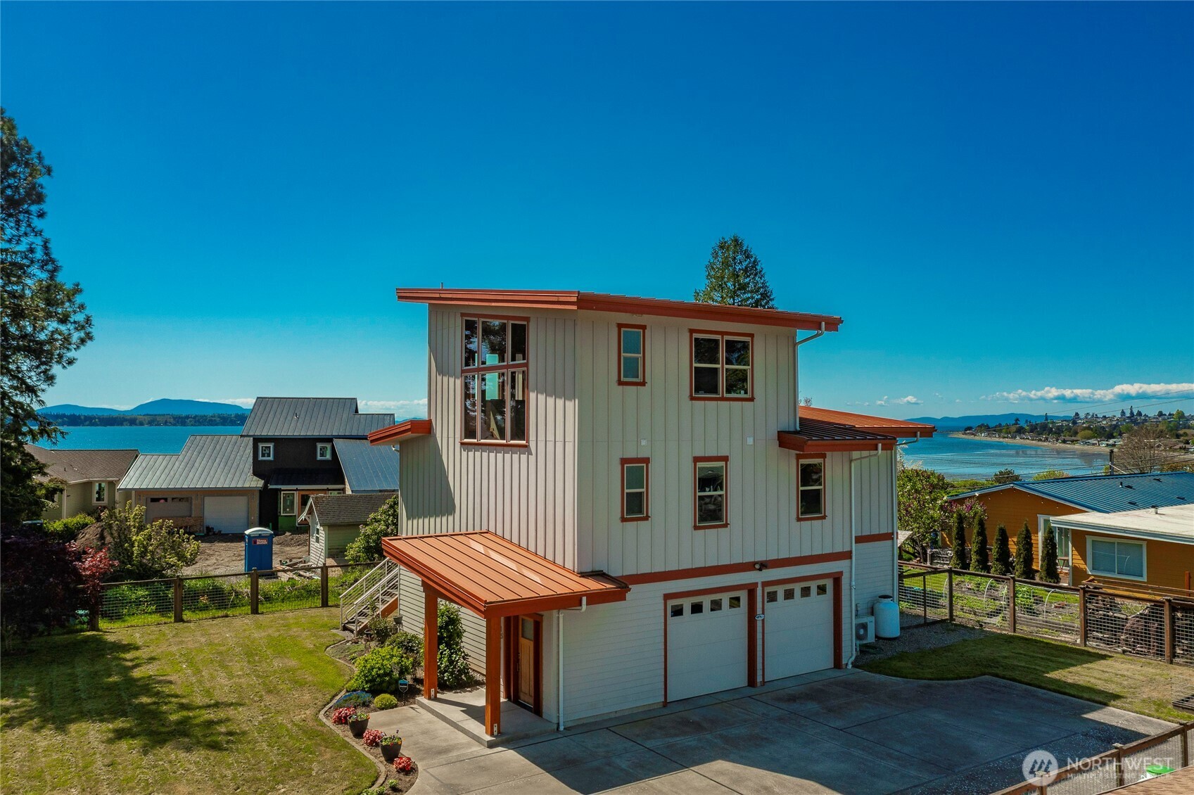 8285 Sunset Street Blaine, WA 98230 - Photo 8 of 38 a front view of house with yard and seating area