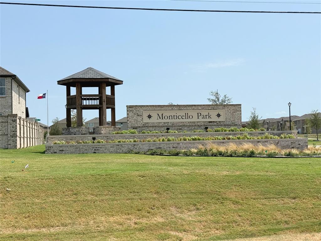 713 Roanoke Drive Princeton, TX 75407 - Photo 39 of 40 Community sign featuring a lawn