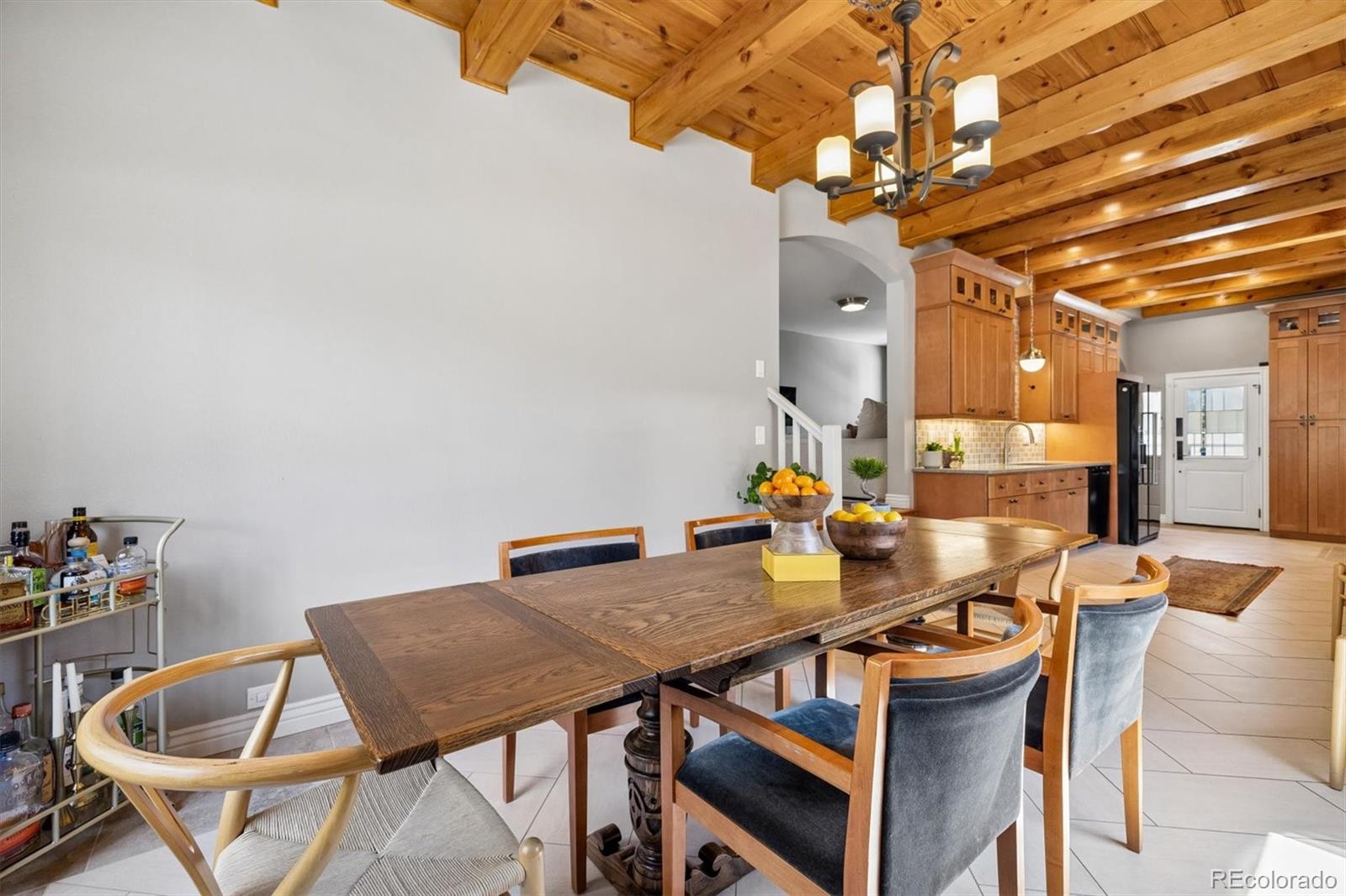 730 Ivanhoe Street Denver, CO 80220 - Photo 19 of 34 a view of a dining room with furniture