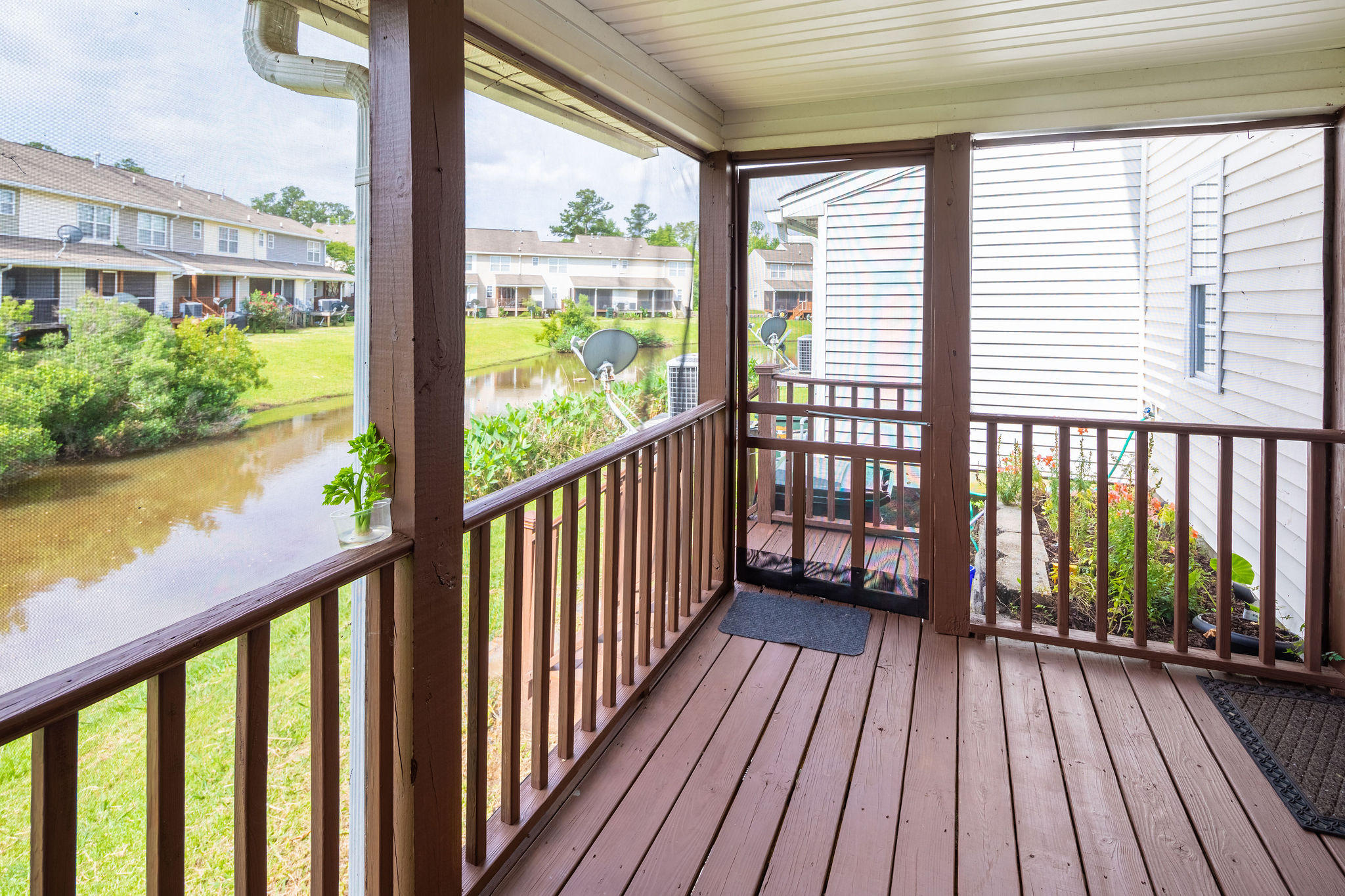 435 Doane Way Wando, SC 29492 - Photo 22 of 29 Screened Porch Pond View