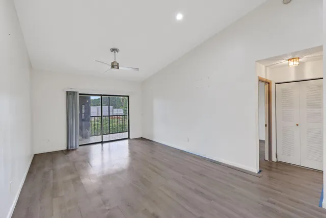 a view of a livingroom with wooden floor
