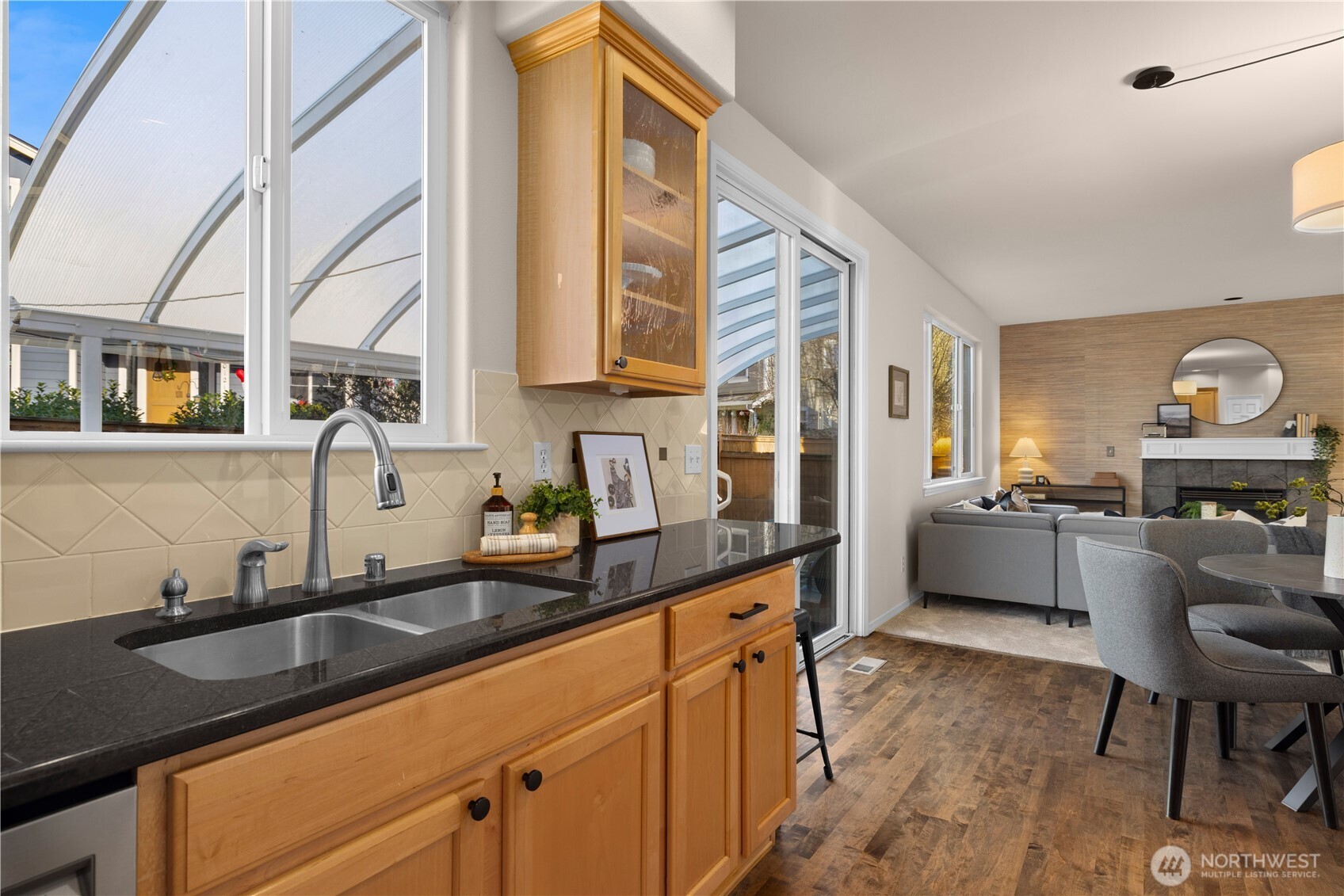 105 202nd Street Southeast Bothell, WA 98012 - Photo 18 of 40 a kitchen with stainless steel appliances a sink and cabinets