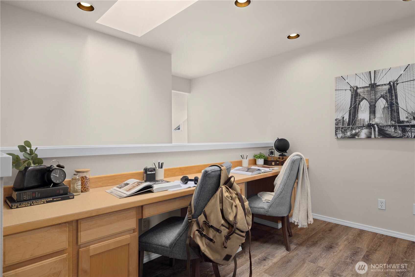 105 202nd Street Southeast Bothell, WA 98012 - Photo 21 of 40 a view of a workspace with furniture and wooden floor