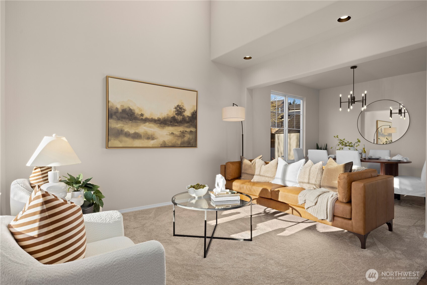105 202nd Street Southeast Bothell, WA 98012 - Photo 3 of 40 a living room with furniture and a chandelier