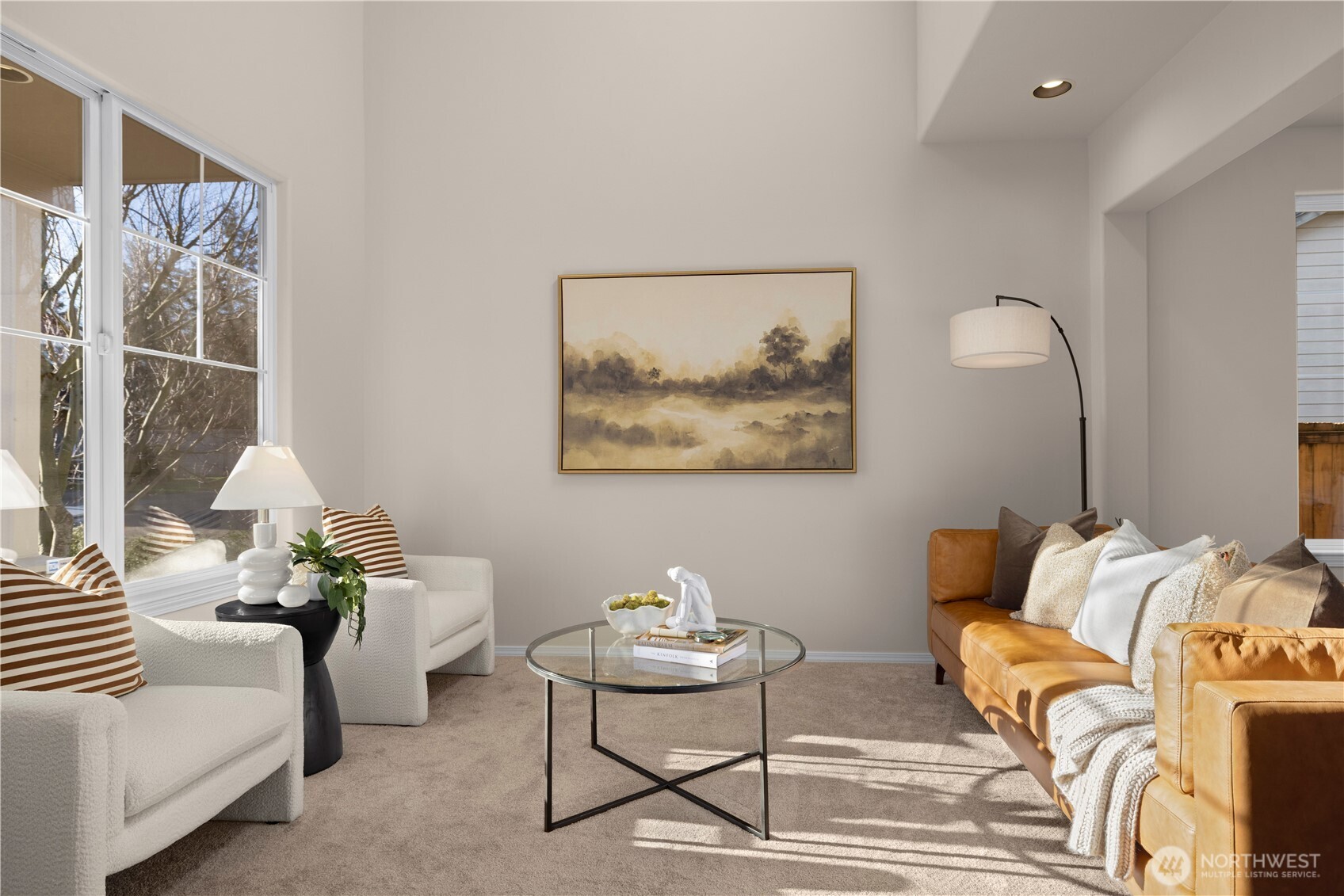105 202nd Street Southeast Bothell, WA 98012 - Photo 7 of 40 a living room with furniture a table and chair