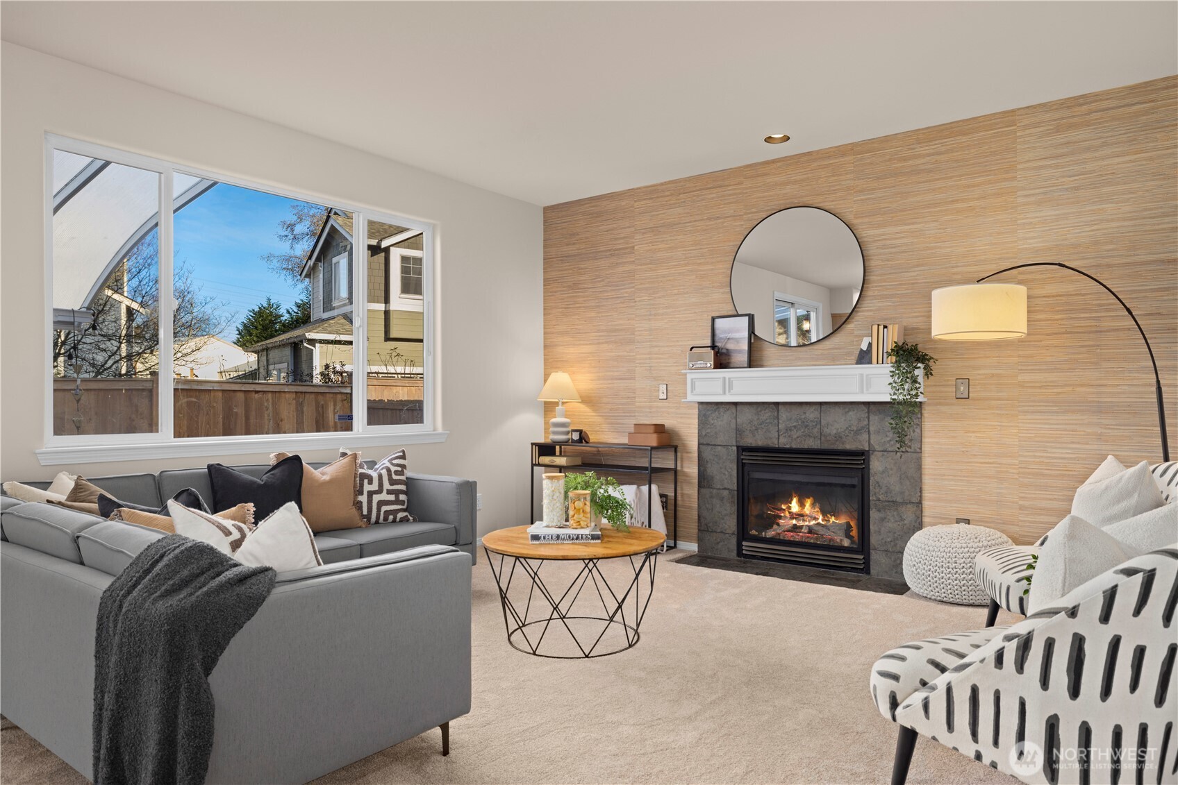 105 202nd Street Southeast Bothell, WA 98012 - Photo 8 of 40 a living room with furniture and a fireplace