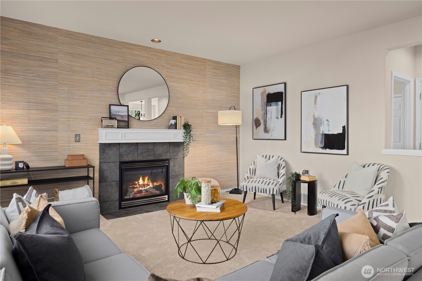 105 202nd Street Southeast Bothell, WA 98012 - Photo 10 of 40 a living room with furniture and a fireplace