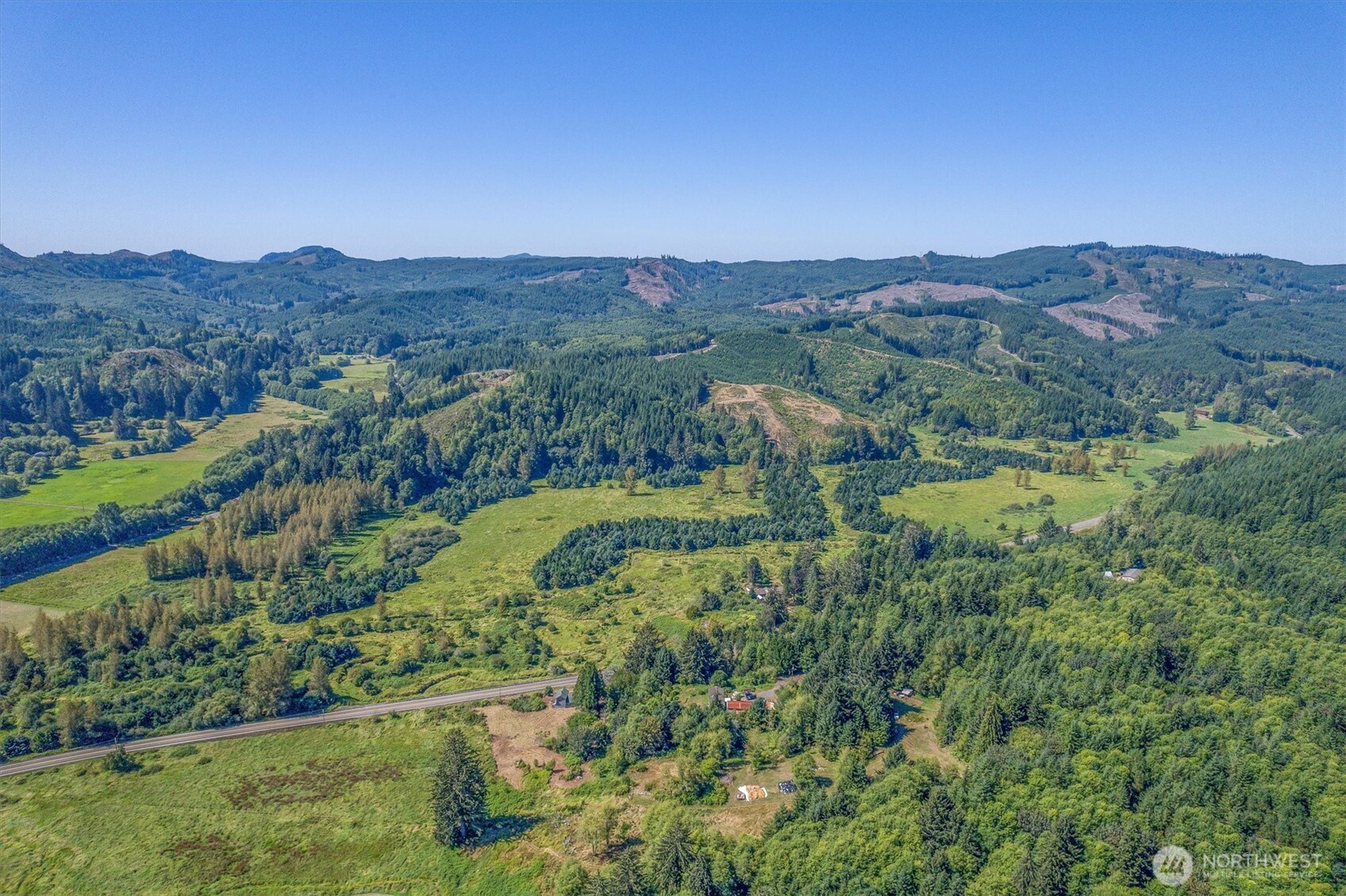 1929 Highway 4 Skamokawa, WA 98647 - Photo 1 of 1 an aerial view of a residential houses and mountain view