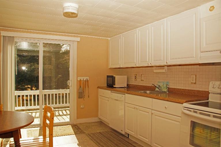 21 Gilbert Road Dennis Port, MA 02639 - Photo 11 of 18 a view of a kitchen with a sink