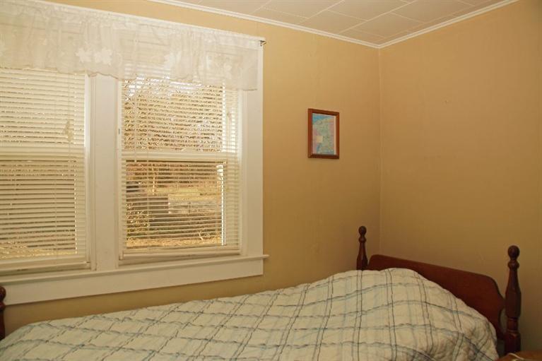 21 Gilbert Road Dennis Port, MA 02639 - Photo 16 of 18 a bedroom with a bed and a window