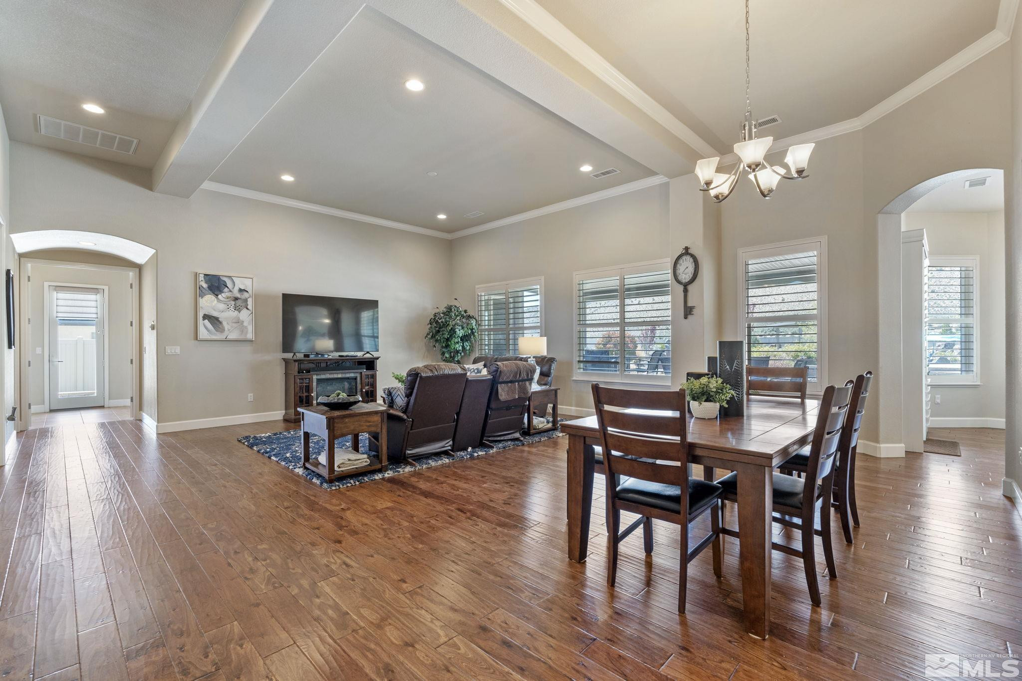 12265 Hidden Sparks, NV 89441 - Photo 11 of 39 a view of a a dining room with furniture window and wooden floor