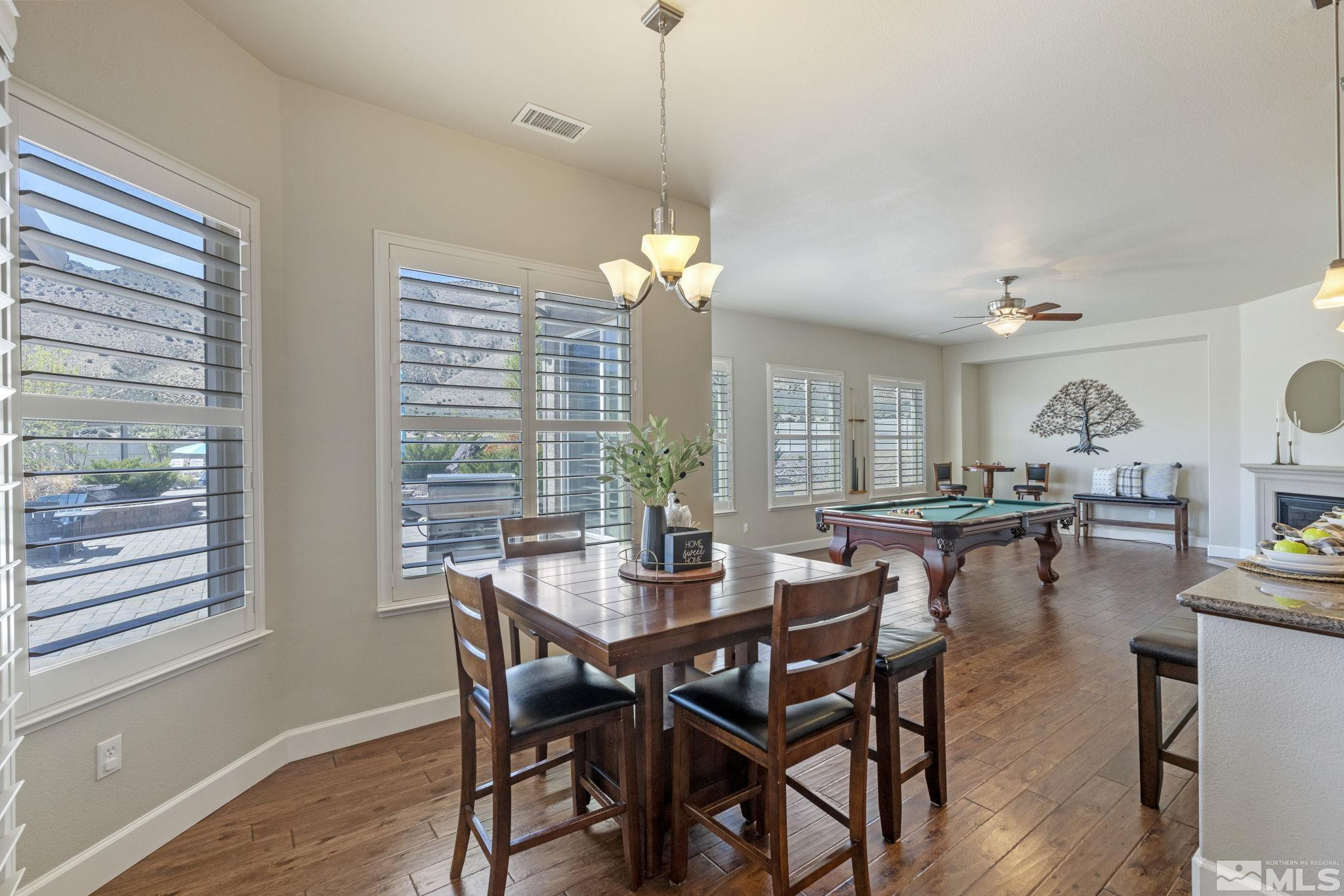 12265 Hidden Sparks, NV 89441 - Photo 17 of 39 a dining room with furniture and window