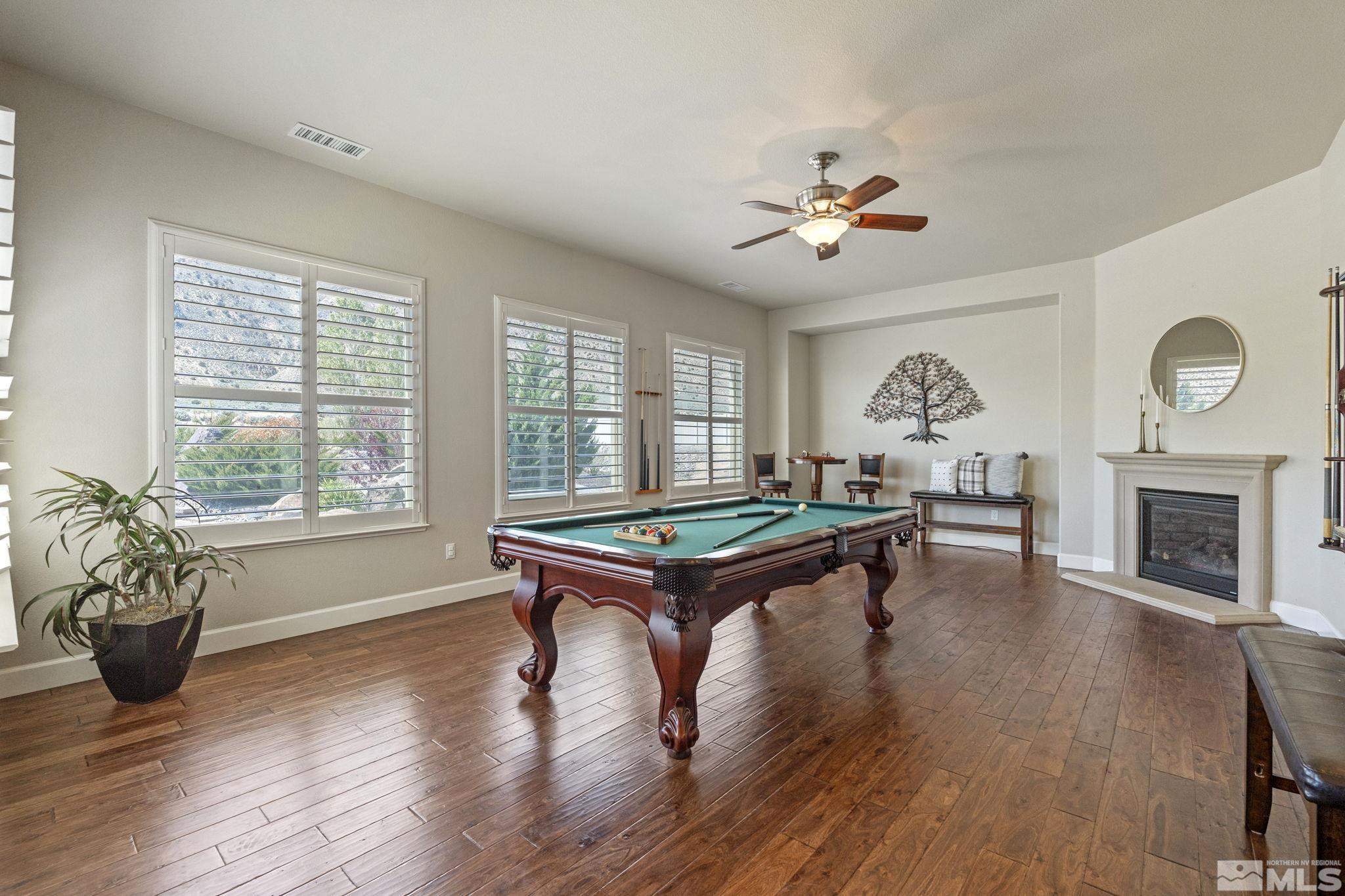 12265 Hidden Sparks, NV 89441 - Photo 20 of 39 a living room with furniture and a fireplace