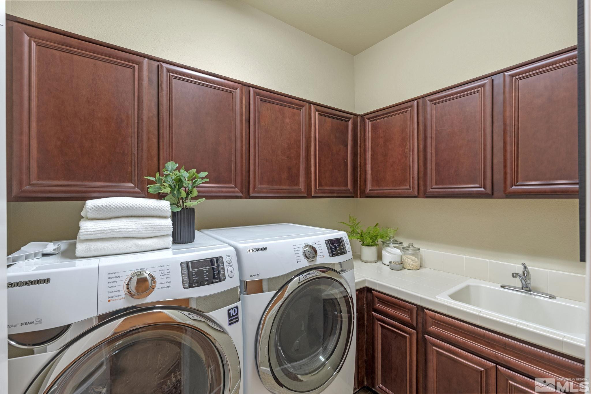 12265 Hidden Sparks, NV 89441 - Photo 29 of 39 a utility room with dryer and washer