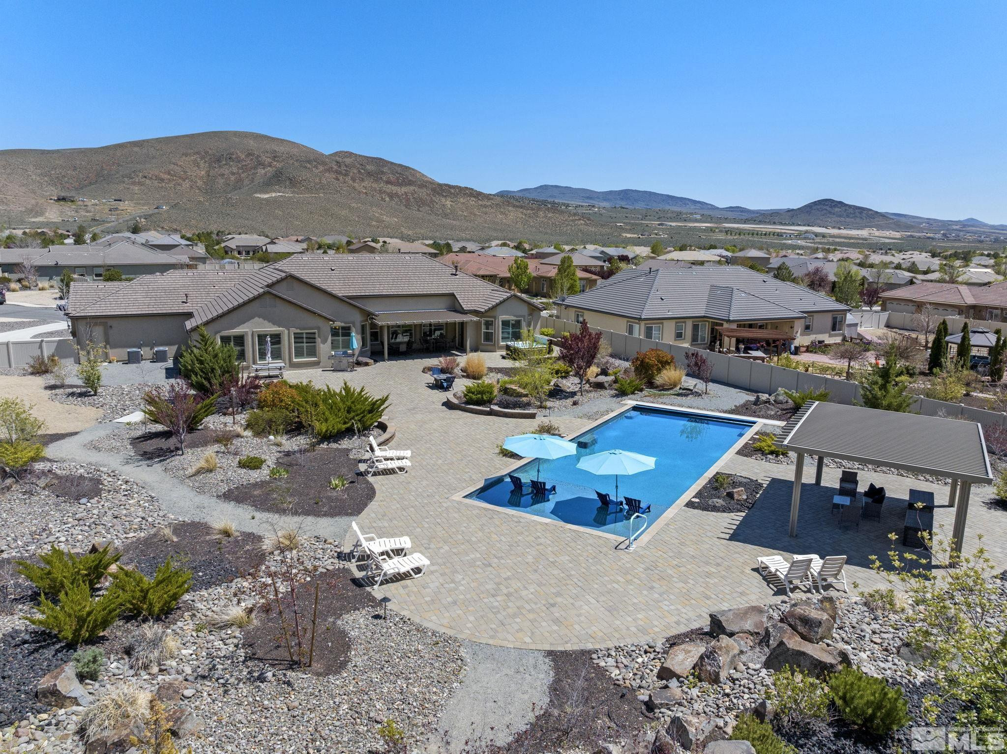 12265 Hidden Sparks, NV 89441 - Photo 30 of 39 a view of a terrace with a garden