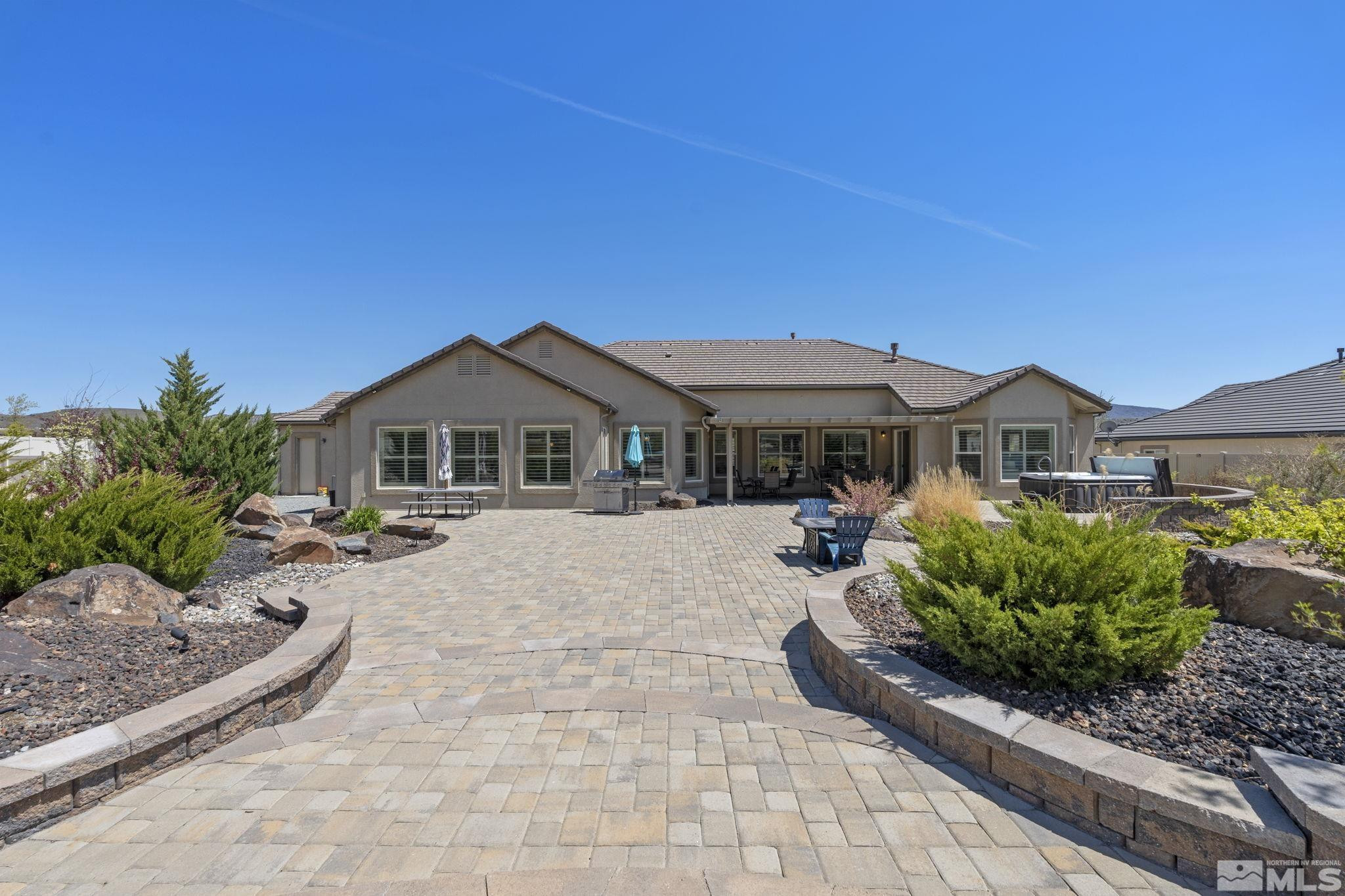 12265 Hidden Sparks, NV 89441 - Photo 34 of 39 a front view of a house with garden