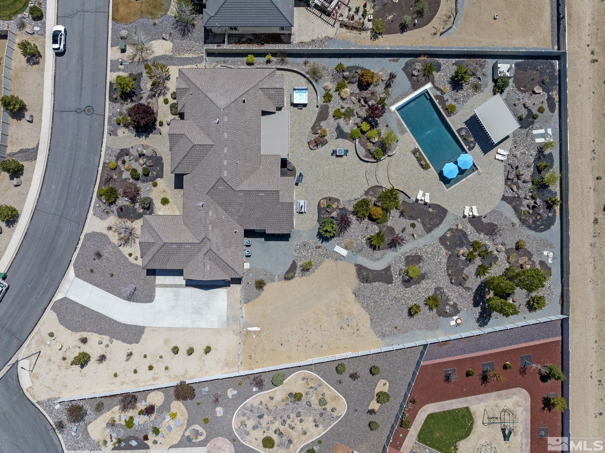 12265 Hidden Sparks, NV 89441 - Photo 39 of 39 an aerial view of multi story residential apartment building with entryway