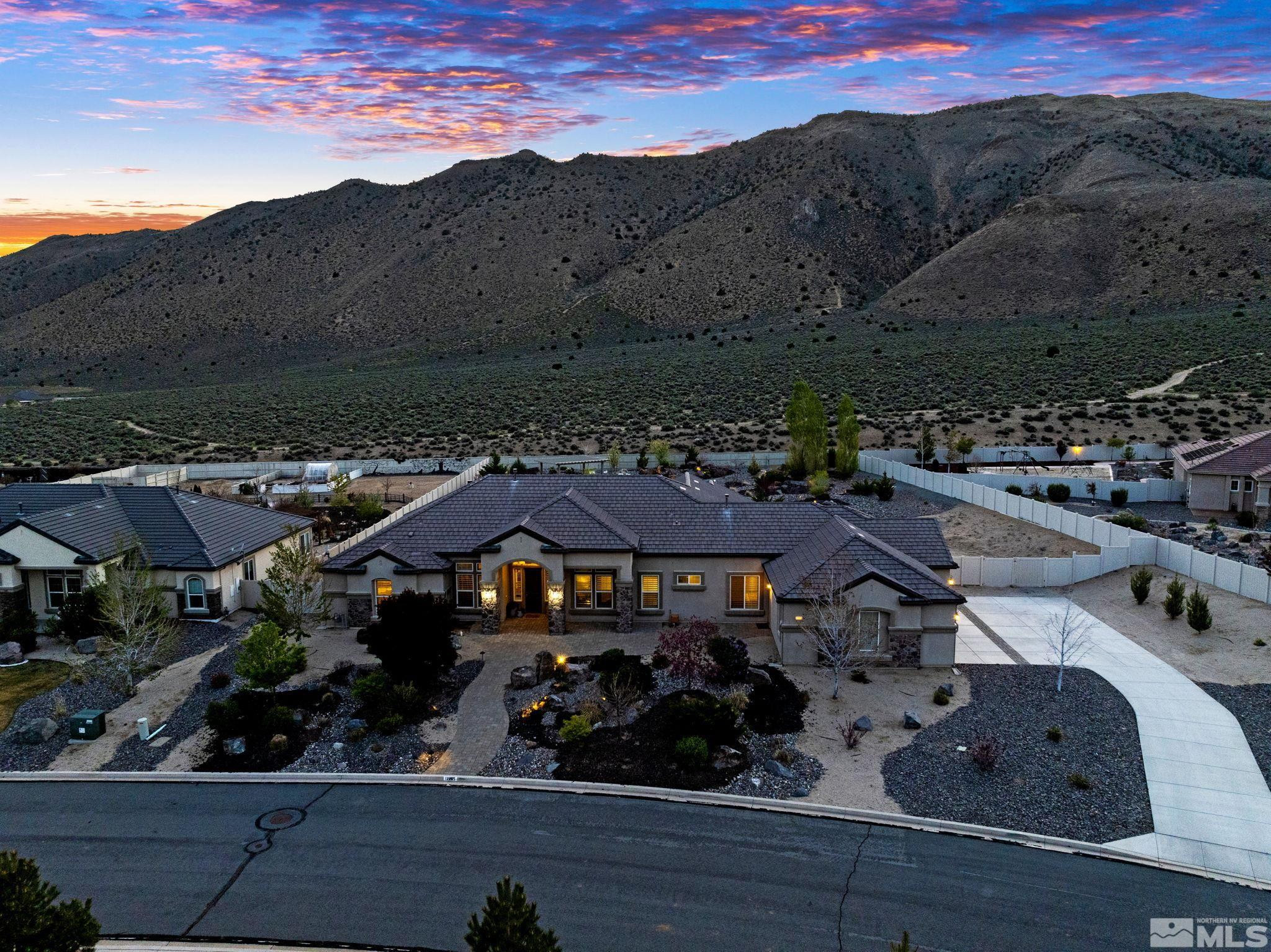 12265 Hidden Sparks, NV 89441 - Photo 7 of 39 a view of multiple houses with a road