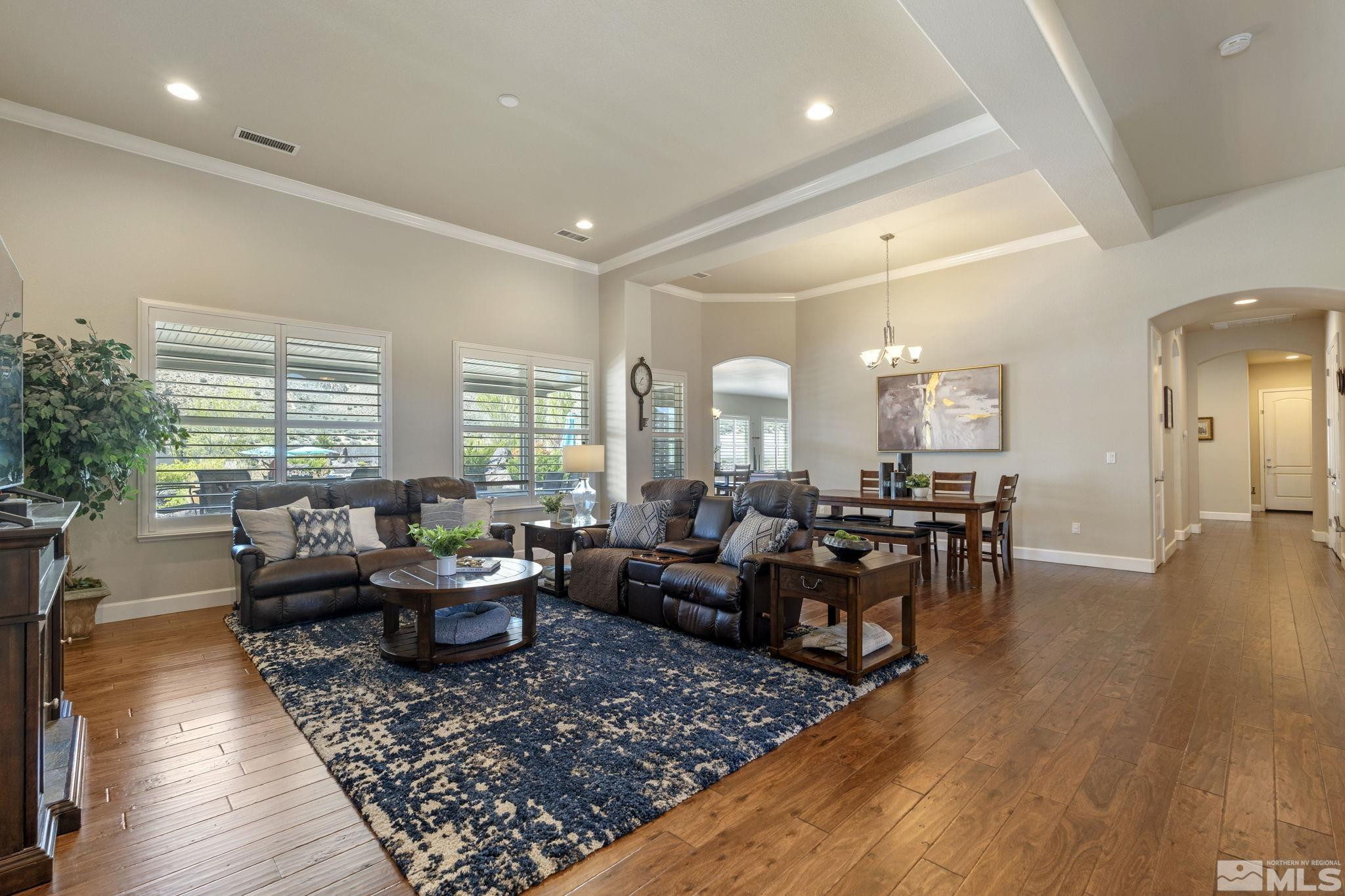 12265 Hidden Sparks, NV 89441 - Photo 10 of 39 a living room with furniture and wooden floor