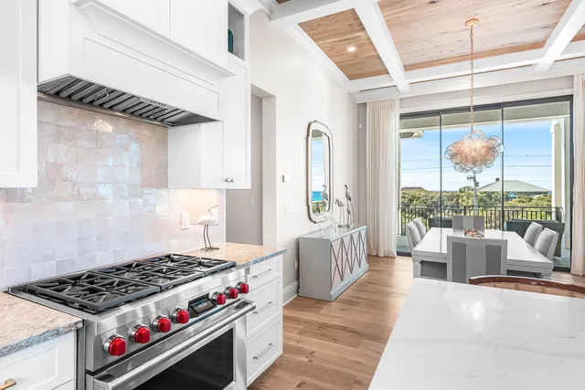 a bedroom with a bed and a television