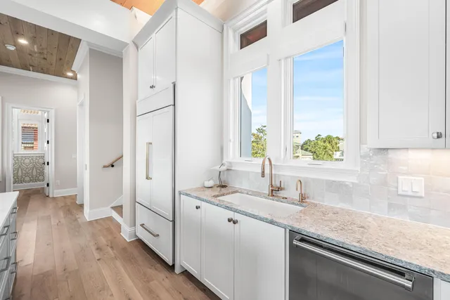 a view of a livingroom with wooden floor