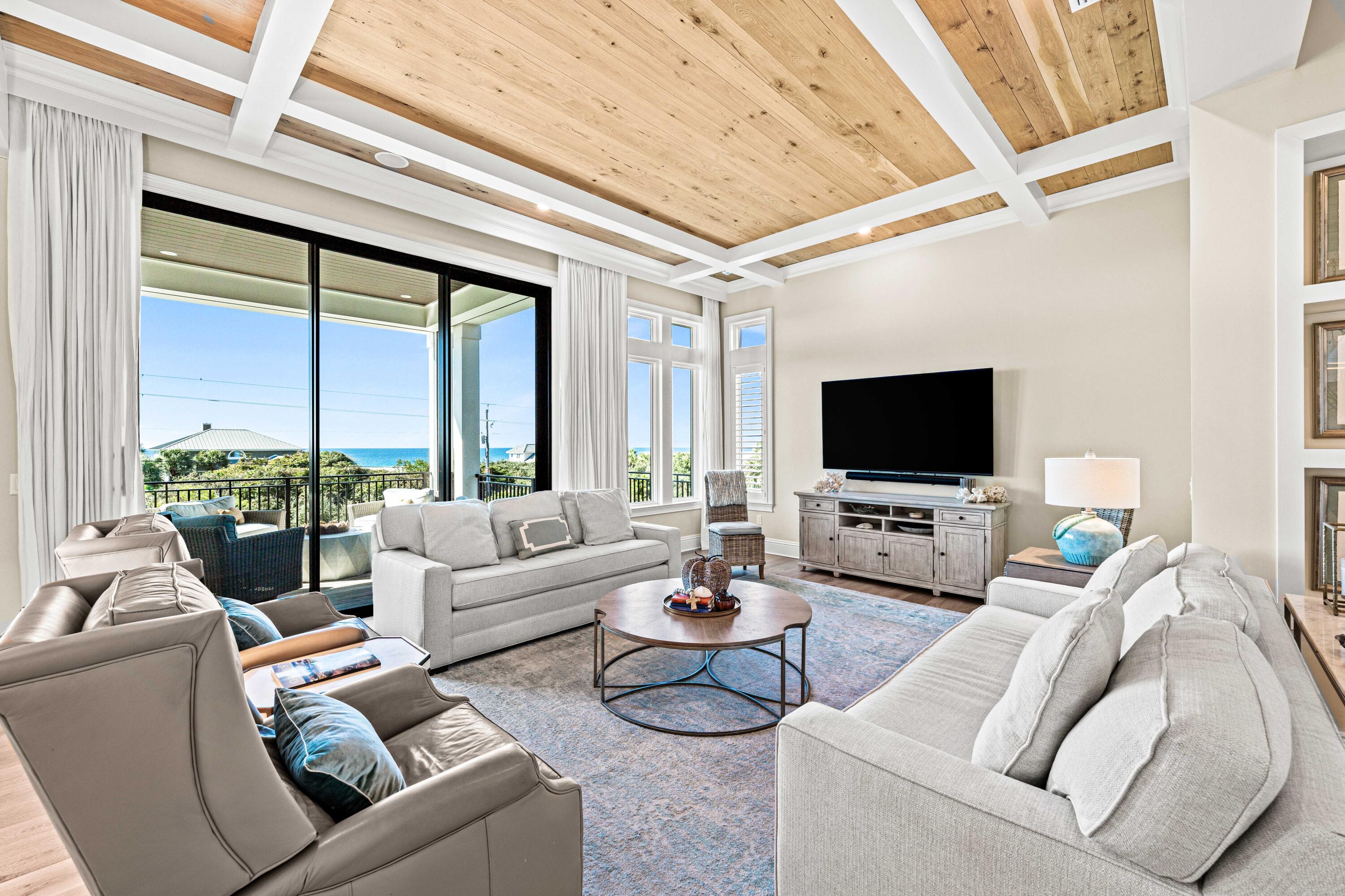 102 Sea Winds Drive Santa Rosa Beach, FL 32459 - Photo 25 of 93 a living room with furniture and a flat screen tv