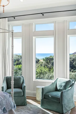 a open kitchen with a sink and wooden floor