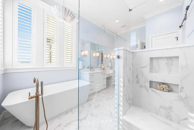 an aerial view of a house with a ocean view