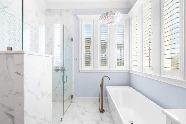 a balcony with furniture and wooden floor