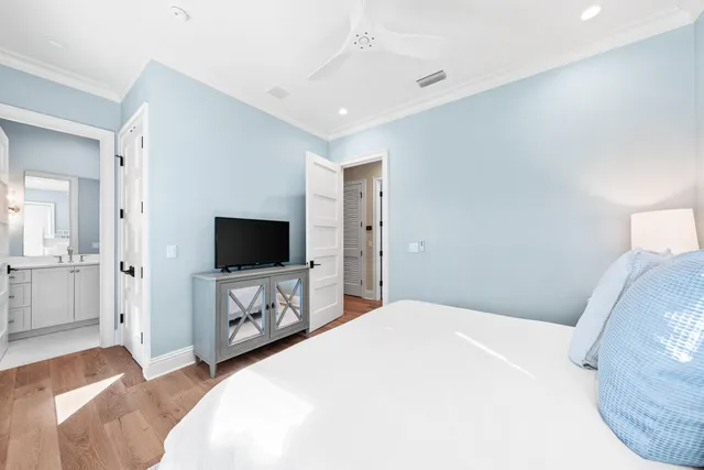 an aerial view of residential houses with outdoor space and street view