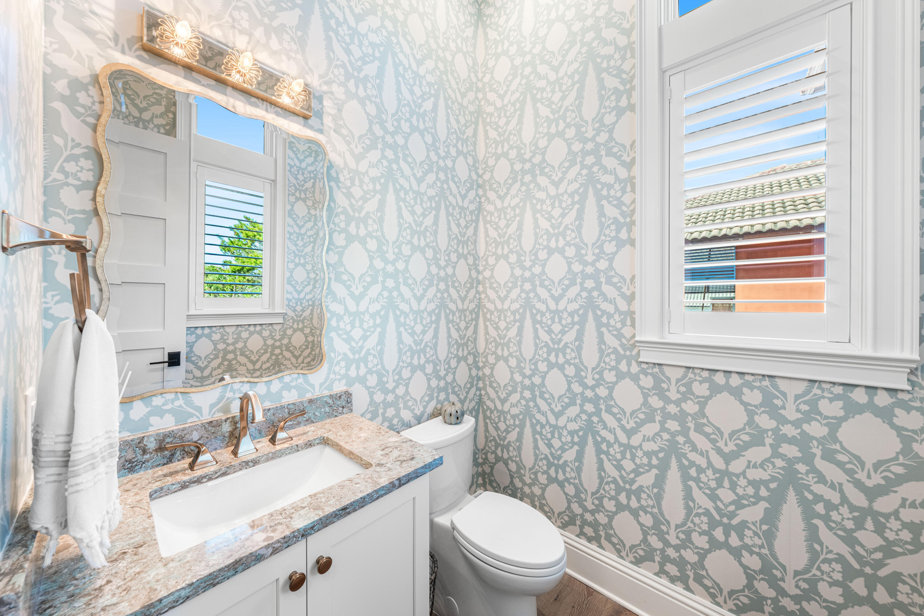 102 Sea Winds Drive Santa Rosa Beach, FL 32459 - Photo 37 of 93 a bathroom with a granite countertop toilet a sink a mirror a window and a shower