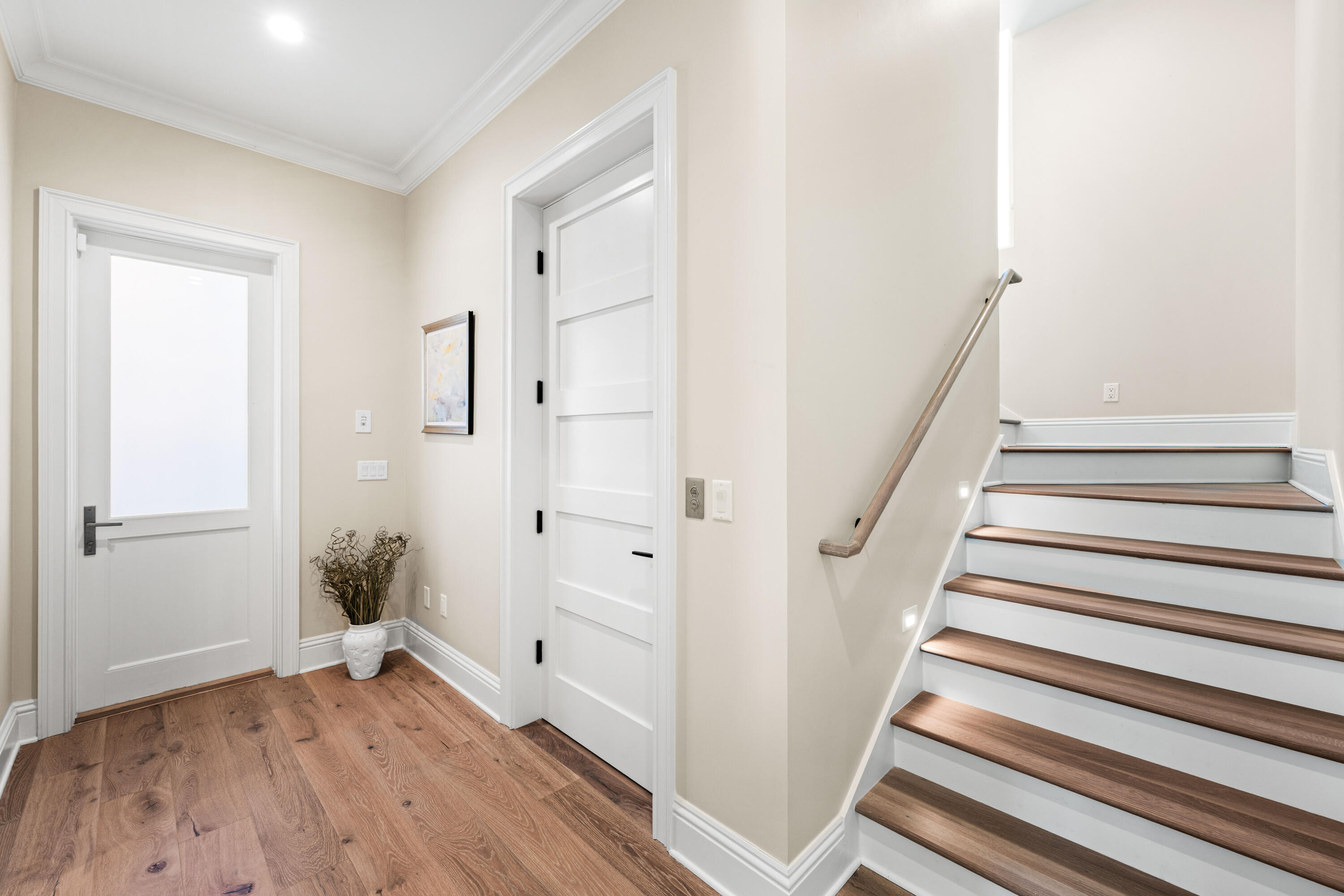 102 Sea Winds Drive Santa Rosa Beach, FL 32459 - Photo 61 of 93 a view of a hallway with wooden floor and entryway