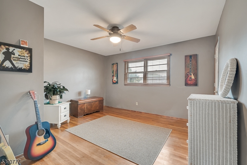 279 Madison Hill Road Clark, NJ 07066 - Photo 19 of 35 a living room with furniture and a window