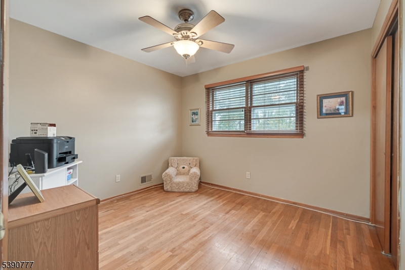 279 Madison Hill Road Clark, NJ 07066 - Photo 20 of 35 a view of workspace with wooden floor and window