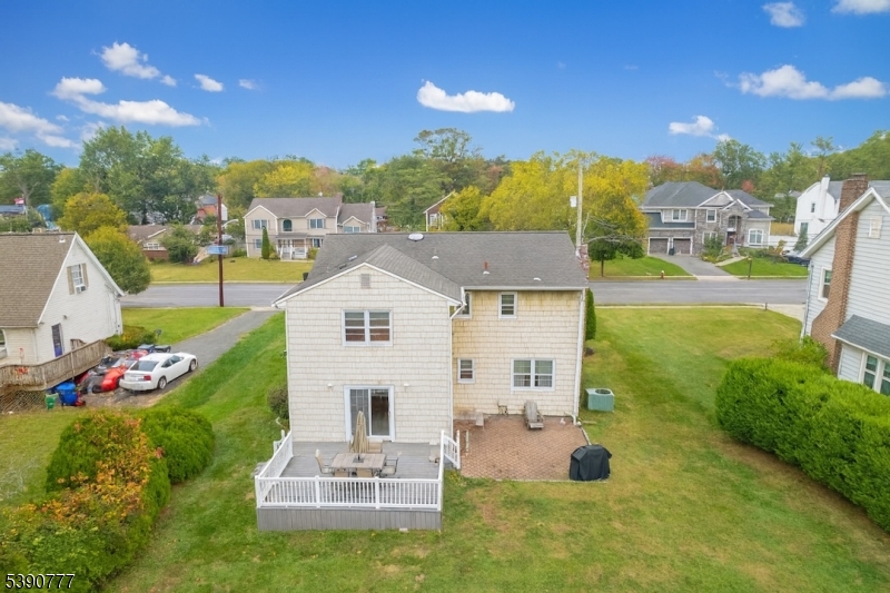 279 Madison Hill Road Clark, NJ 07066 - Photo 26 of 35 a front view of a house with garden