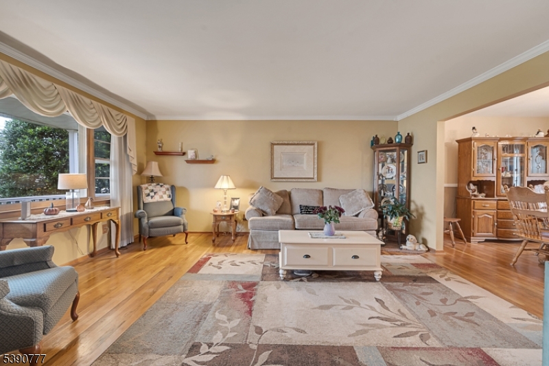 279 Madison Hill Road Clark, NJ 07066 - Photo 4 of 35 a living room with furniture and a large window