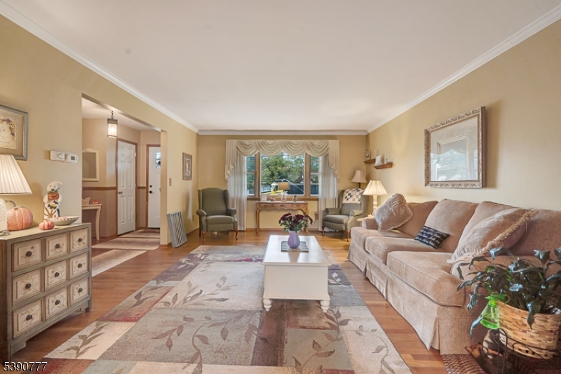 279 Madison Hill Road Clark, NJ 07066 - Photo 5 of 35 a living room with furniture and large windows