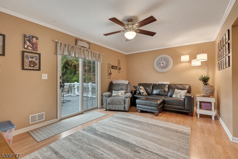 279 Madison Hill Road Clark, NJ 07066 - Photo 10 of 35 a living room with furniture and a large window