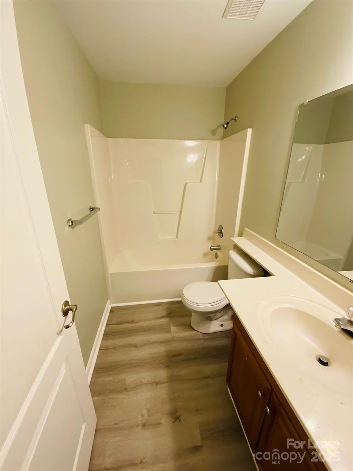 1646 Termini Drive Charlotte, NC 28262 - Photo 7 of 8 a bathroom with a sink a toilet and tub